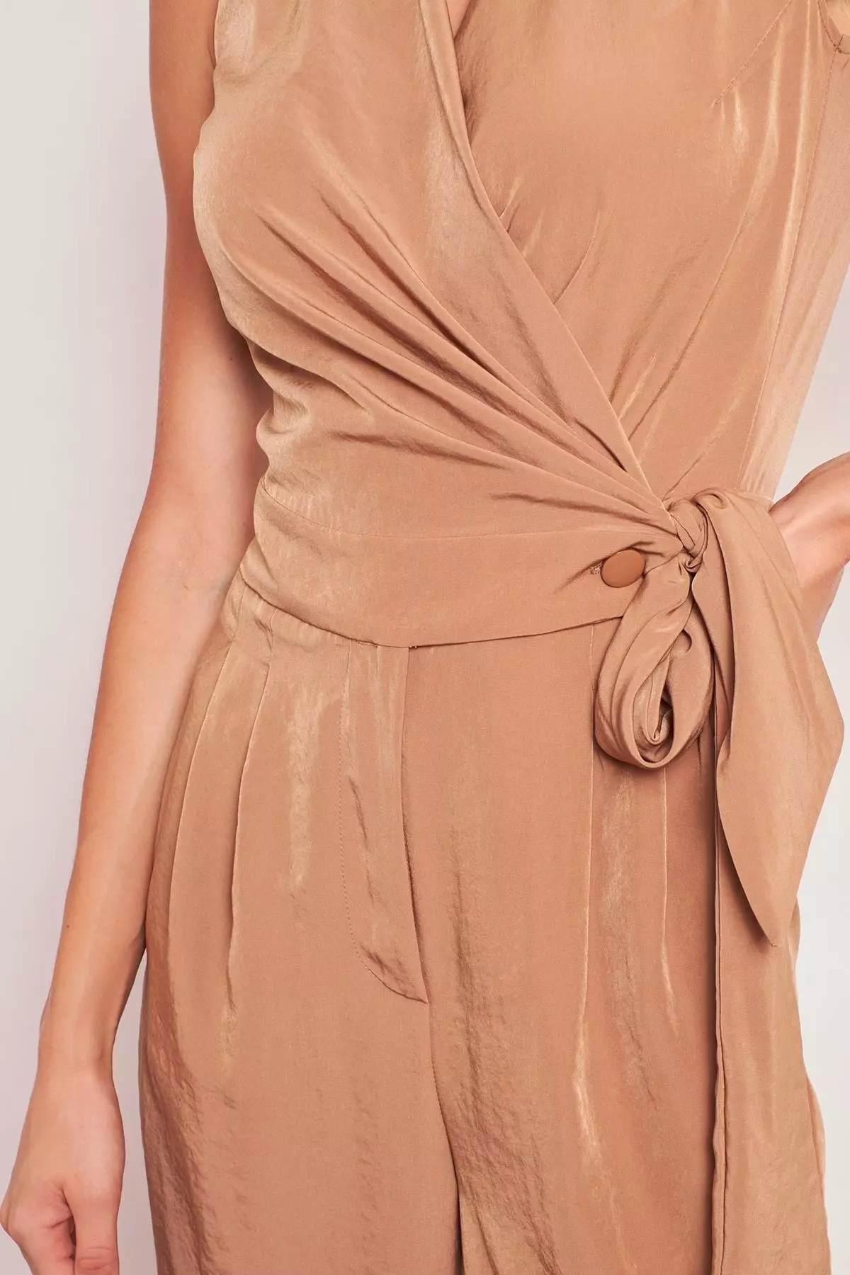 Tire Tracks Crossed Strap Pocketed Front Ruffled Wide Leg Jumpsuit - Camel