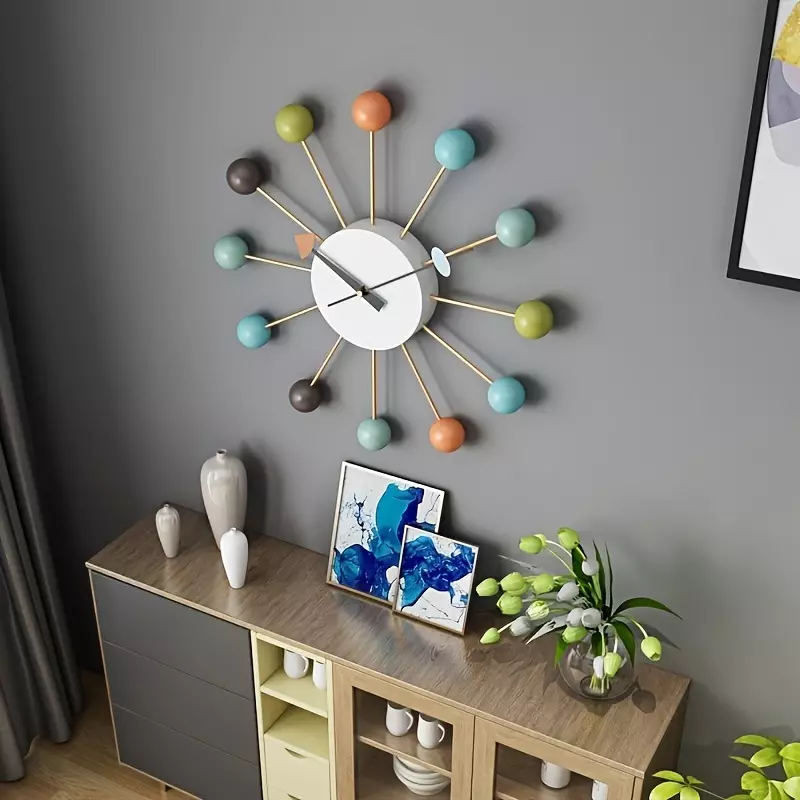 Add a Pop of Color to Your Nursery Room with this Creative & Mute Wall Clock!